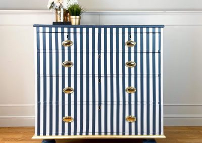 Refinished blue and white striped chest of drawers by Amy Edwards Home